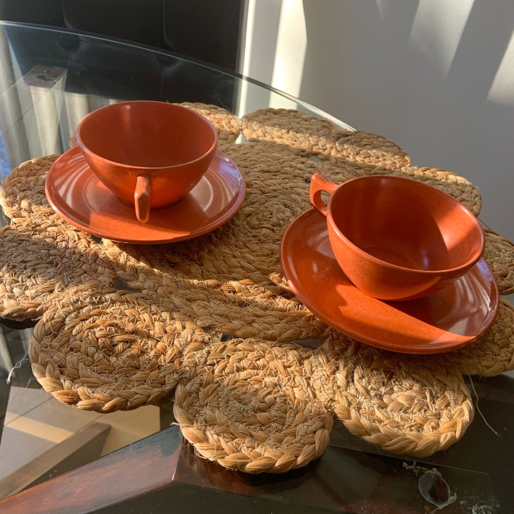 Two vintage melmac cup and saucers.
